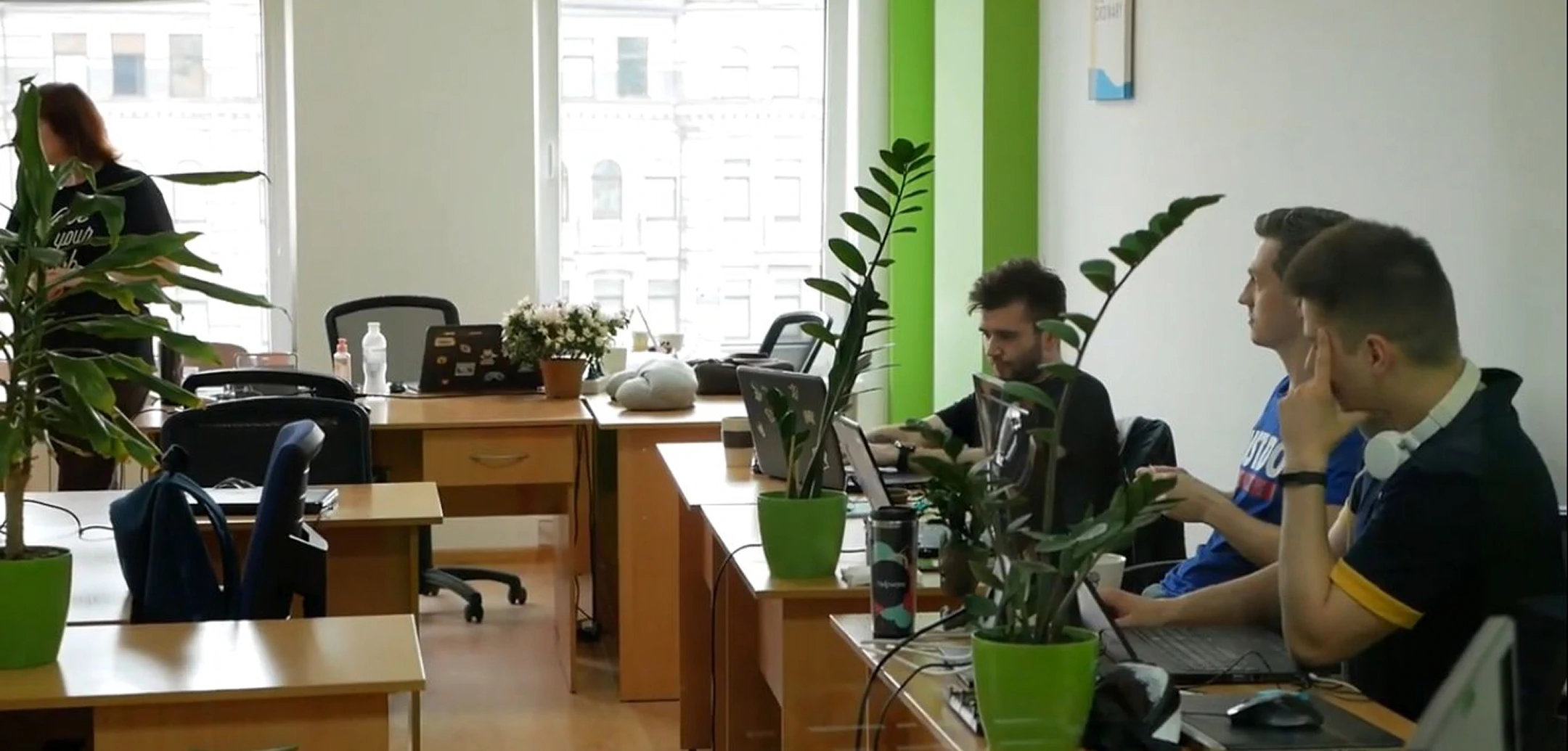 Employees working in an office environment.