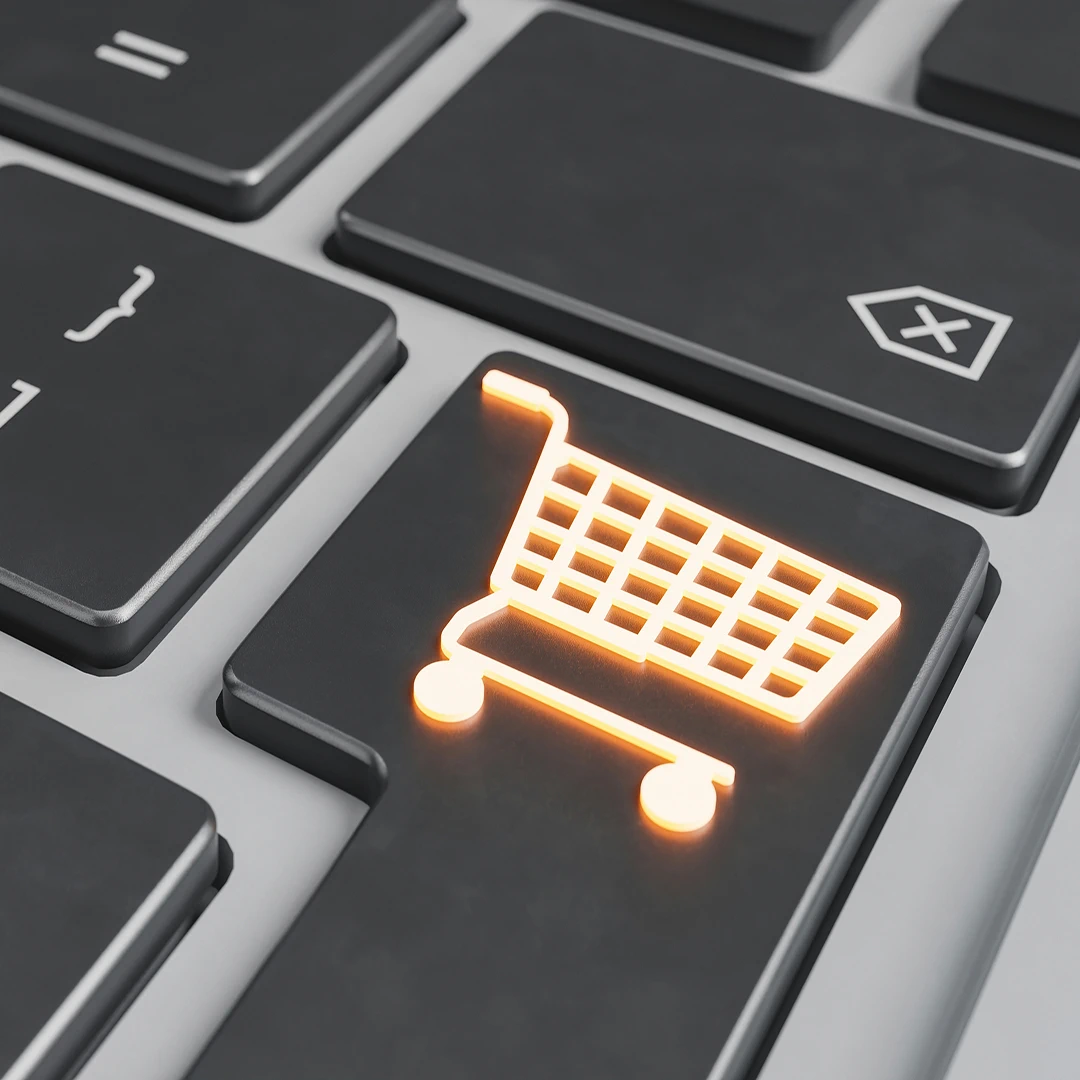 Shopping cart icon button on a computer keyboard