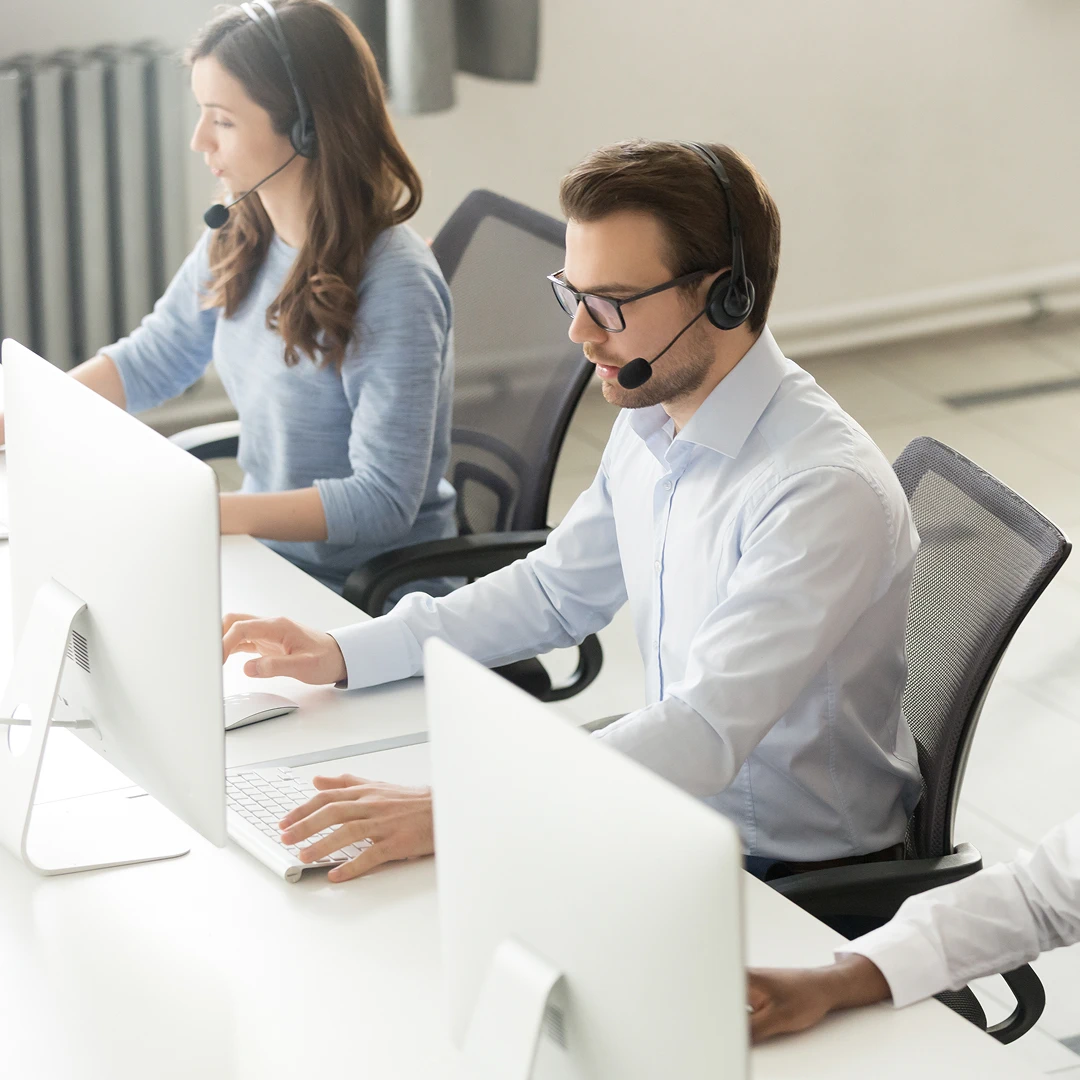 A modern call center in Los Angeles with diligent customer support representatives at work