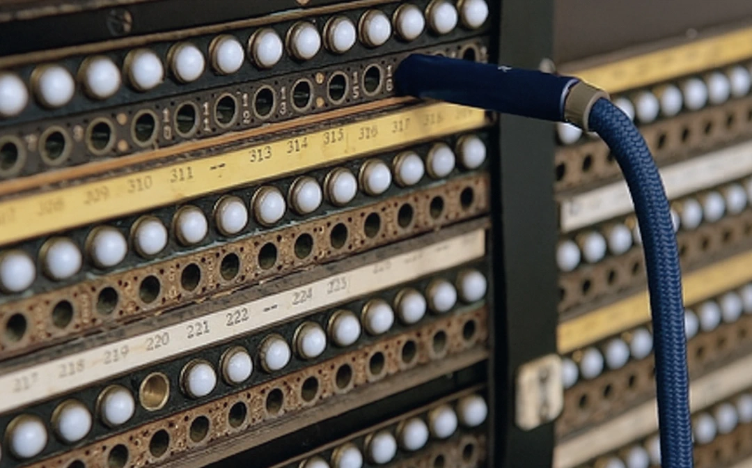 Vintage telephone switchboard with cord