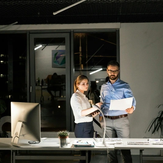 male and female working on a project